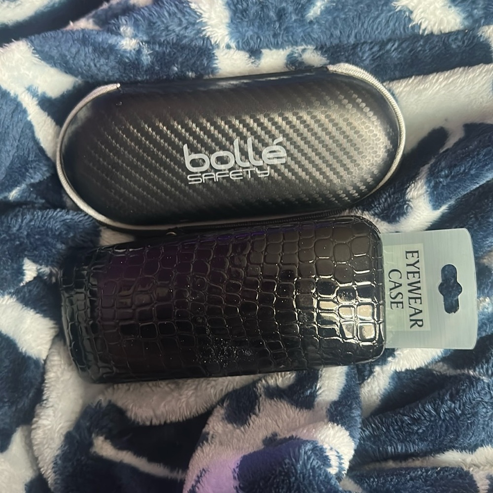 Target Black Eyewear Case with an additional used case from bollé